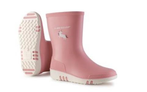 Bottes Dunlop mini roses et blanches, semelles blanches, motif licorne. Une botte debout, l'autre de côté montre la semelle.